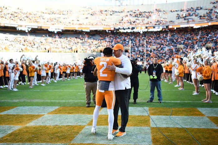 Tennessee Head Coach Josh Heupel hugs defensive back Alontae Taylor (2) during senior day ceremonies before the start of the NCAA college football game between the Tennesse Volunteers and Vanderbilt Commodores in Knoxville, Tenn. on Saturday, November 27, 2021. Kns Tennessee Vanderbilt Football